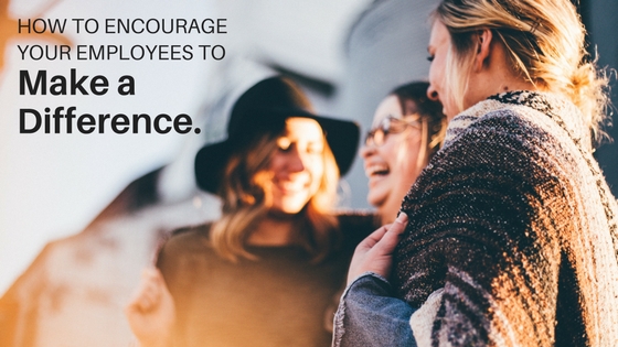 Group of people standing together, smiling and laughing, image used for Ari Monkarsh blog on how to encourage employees to make a difference
